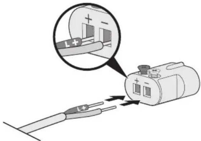 Diagram showing a battery connected to a terminal with L+ labels, illustrating the process of charging and discharging.