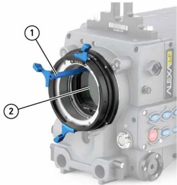 Technical diagram of a camera module with labeled parts, showing blue adjustment knobs and component labels 1 and 2.