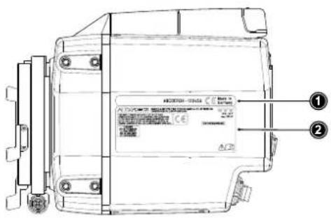 Technical diagram of an electrical component with labeled parts and a warning label