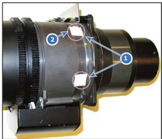 Labeled mechanical component diagram showing two numbered parts with arrows indicating connection points