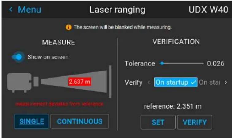 Laser ranging UDX W40 The screen will be blanked while measuring. MEASURE Show on screen 2.637 m measurement denotes from reference SINGLE CONTINUOUS VERIFICATION Tolerance 0.026 Verify < On startup ✓ On start > reference: 2.351 m SET VERIFY