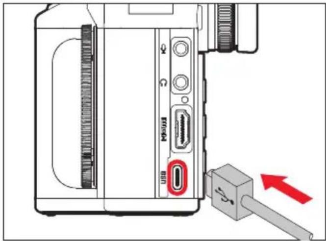 Diagram showing device port connection with USB port and USB cable, highlighting a red arrow indicating insertion or release.