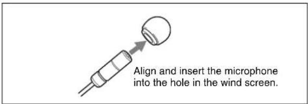 Align and insert the microphone into the hole in the wind screen.