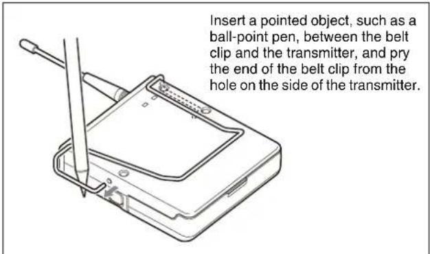 Insert a pointed object, such as a ball-point pen, between the belt clip and the transmitter, and pry the end of the belt clip from the hole on the side of the transmitter.