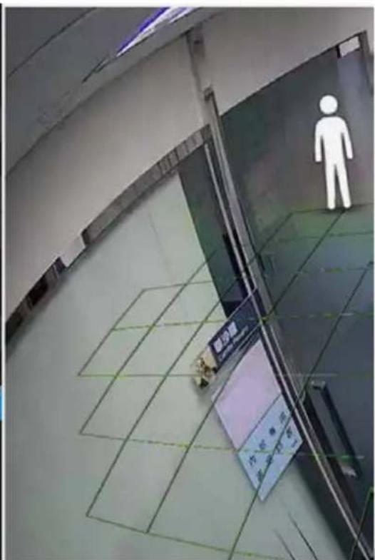 Street photo showing a building entrance with a white human figure and a visible signboard with Chinese characters.