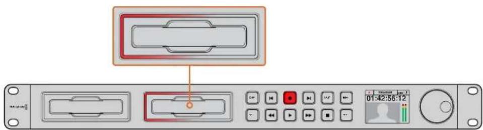 Device control panel with labeled buttons and a red highlighted rectangular area, showing status indicators and playback time.