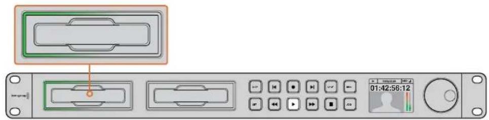 Device control panel with labeled buttons and a digital display showing time, battery, and status