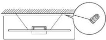 Diagram showing a mechanical setup with a component and a magnified view of a device labeled '12'