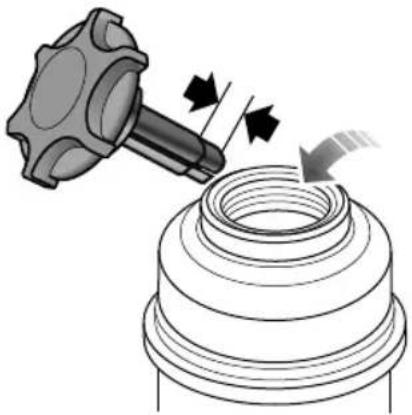 Mechanical assembly diagram showing a hammer striking a cylindrical component with directional arrows (no text or symbols)