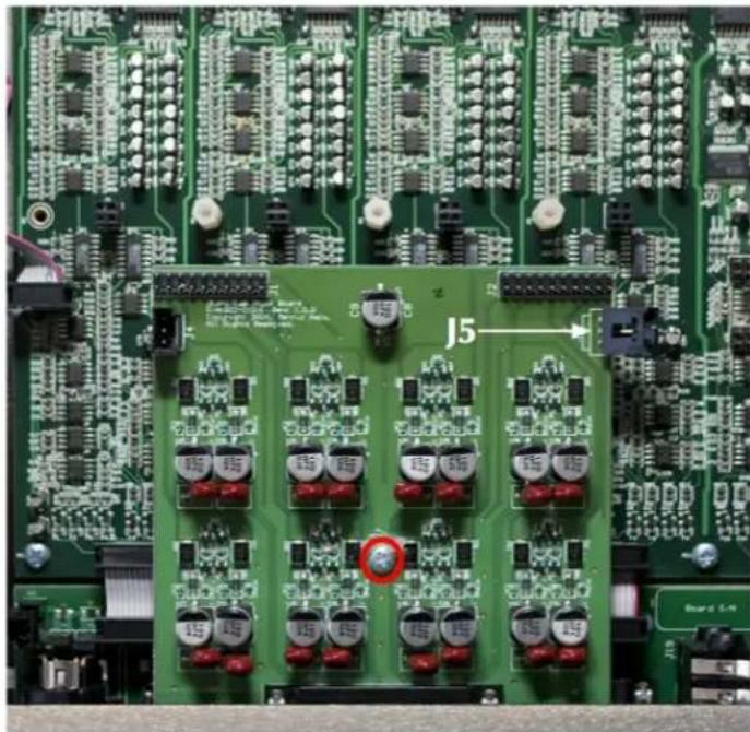 Close-up of a green printed circuit board with multiple electronic components and connectors (no readable text or symbols)