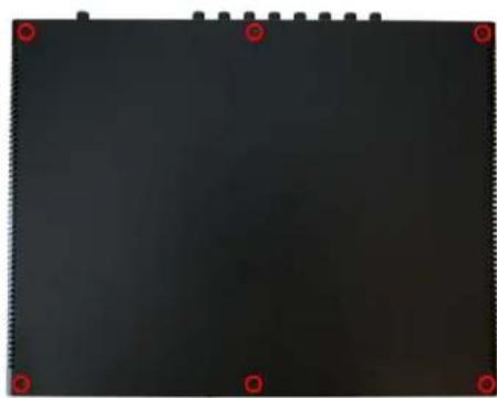 Black rectangular object with red circular markers at corners (no text or symbols)