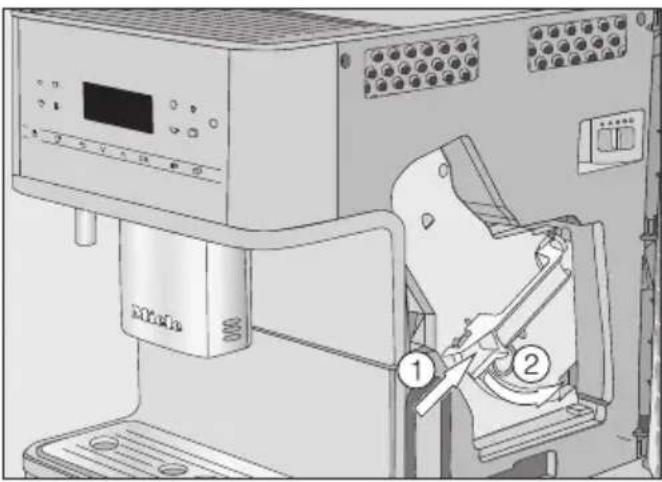 MIELE MilkPerfection CM 6560 - Rengøringstabletten kommes i bryggeenheden - 2