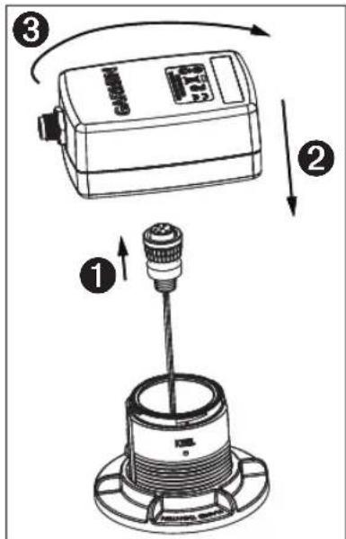 Technical diagram showing a sensor device with labeled parts and directional arrows indicating motion or assembly.