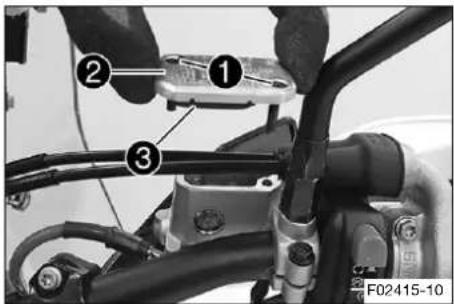 Mechanical assembly diagram showing labeled parts of a vehicle brake system with numbered annotations