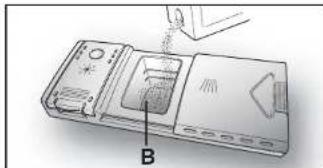 Diagram of a device with labeled parts and a tool, showing no readable text or symbols.