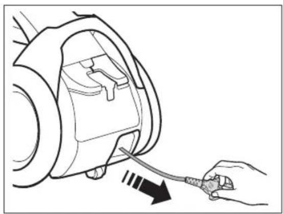 Line drawing of a hand inserting a cable into a device component (no text or symbols)