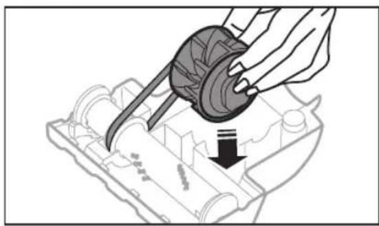 Illustration of a hand using a tool to adjust or install a mechanical component.