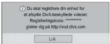 ① Du skal registrere din enhed for at afspille DivX-beskyttede videer. Registreringskode: ****** gistrer dig på http://vod.dlvx.com Luk