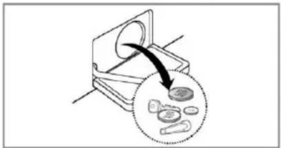 Diagram illustrating a mechanical device with a magnified inset showing internal components, likely illustrating a machining or processing process.