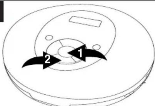 Diagram of a circular device with labeled components, showing numbered arrows pointing to features.