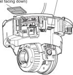 PANASONIC WV-SFR531 - Loosen the cross-head side of tilt table fixing screw (on - 1