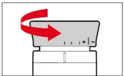 Diagram showing a device with red arrows indicating rotation or movement, labeled with numbers and symbols.