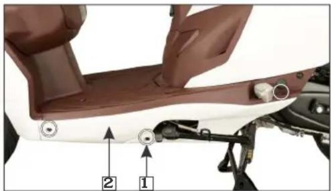 Technical diagram of a motorcycle seat assembly with labeled parts 1 and 2