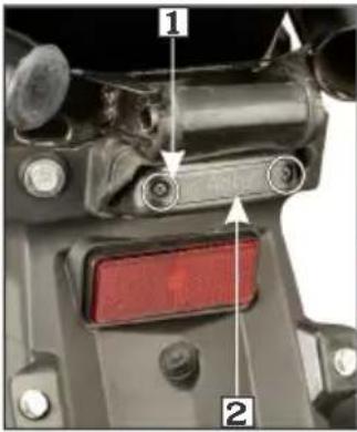 Technical diagram of a mechanical component with numbered parts and directional arrows indicating assembly or alignment.
