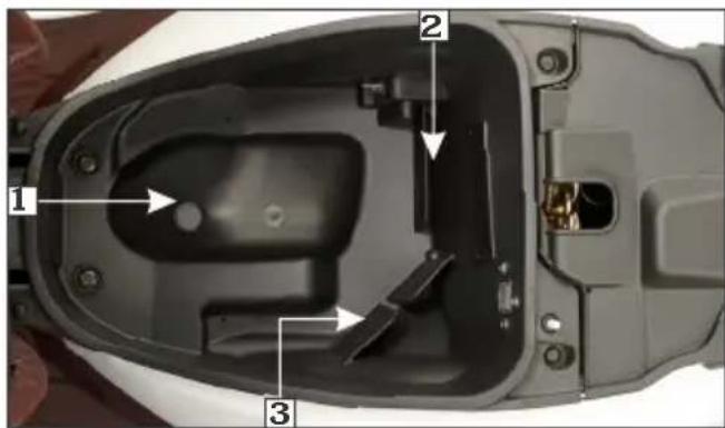 Technical diagram of a device interior with numbered components and directional arrows indicating parts of the body.