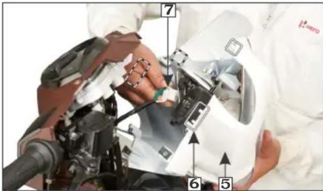 Labeled diagram of a robotic device with numbered parts, likely for assembly or maintenance instructions.