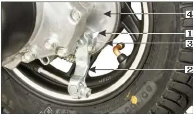 Labeled diagram of a car tire assembly with numbered parts and mechanical components