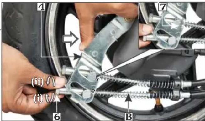 Mechanical diagram showing car tire assembly with labeled parts and directional arrows indicating motion or movement.