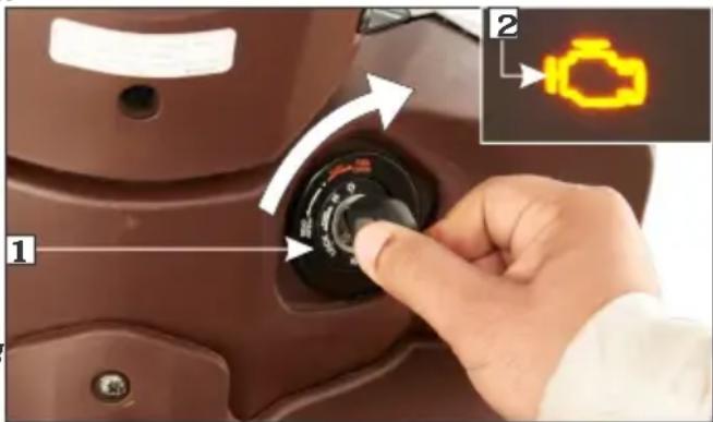 Close-up of a car's rotary dial with labeled buttons and a highlighted camera icon, showing step 1 and 2.