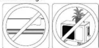 Two safety symbols: a crossed-out line and a crossed-out device with a palm tree, both enclosed in a circle.