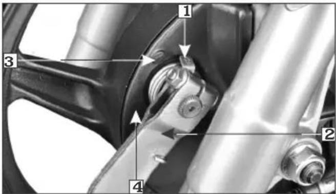 Technical diagram of a mechanical assembly with numbered components and directional arrows indicating parts of motion or assembly.