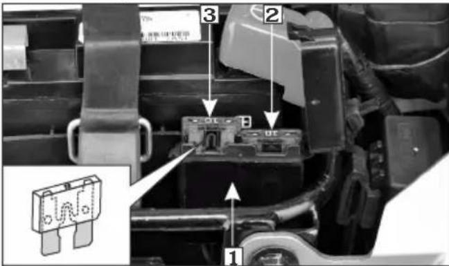 Technical diagram showing labeled components of a vehicle or electrical connector with numbered parts and an inset image of a fuse component.