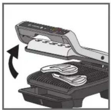 Illustration of a printer with a scroll and a bag, showing mechanical components and a rotation arrow (no text or symbols)