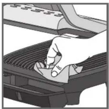 Illustration of a hand pressing down on a mechanical component (no text or symbols visible)