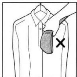 Diagram showing a garment with a shaded chest area and a cross mark, likely indicating a medical or safety hazard.