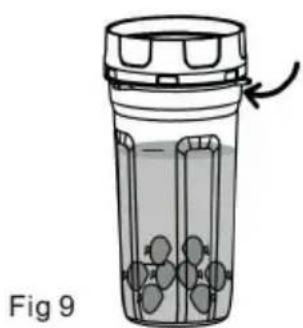 Diagram of a container with internal compartments and particles, labeled Fig 9 (no text or symbols on the diagram itself)