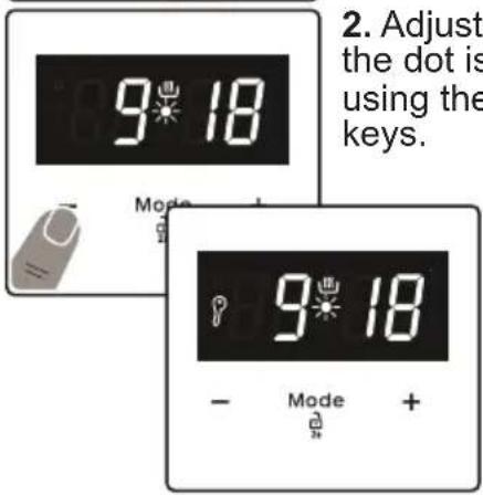 2. Adjust the dot is using the keys. 9:18 Mode - 9:18 Mode +