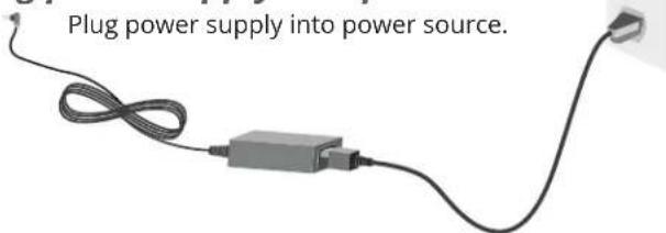 Plug power supply into power source.