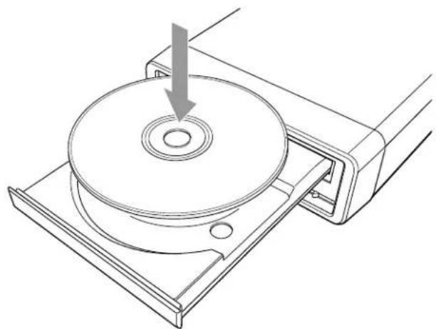 Technical line drawing of a mechanical component with a circular base and mounting bracket, showing a downward arrow indicating a force or direction (no text or symbols present)