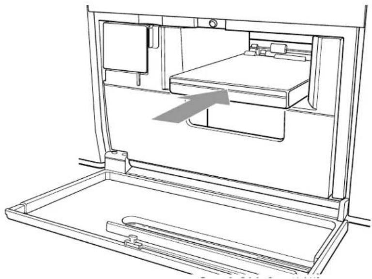 Line drawing of a dormitory compartment with bed, sink, and tray (no text or symbols)