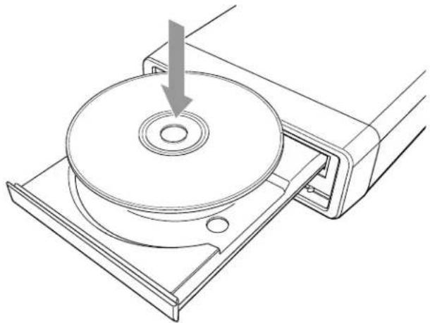Technical line drawing of a mechanical component with a circular base and mounting bracket, showing a downward arrow indicating a force or direction (no text or symbols present)