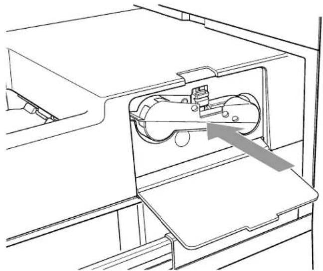 Technical line drawing of a mechanical device with an arrow pointing to a component (no text or symbols present)