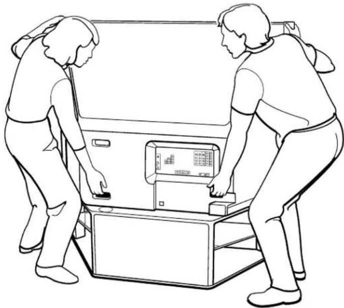 Line drawing of two people assembling or adjusting a device on a table (no text or symbols visible)