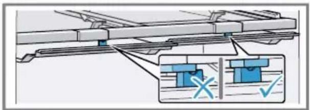 Technical diagram showing mechanical assembly with labeled components and checkmark indicators