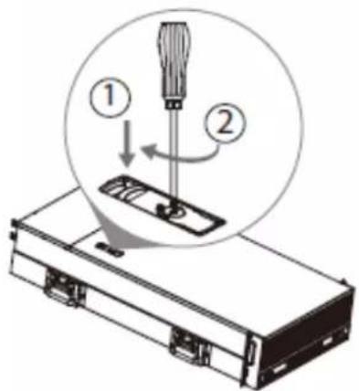 Diagram showing screwdriver tool application on a device with numbered instructions for tool positioning