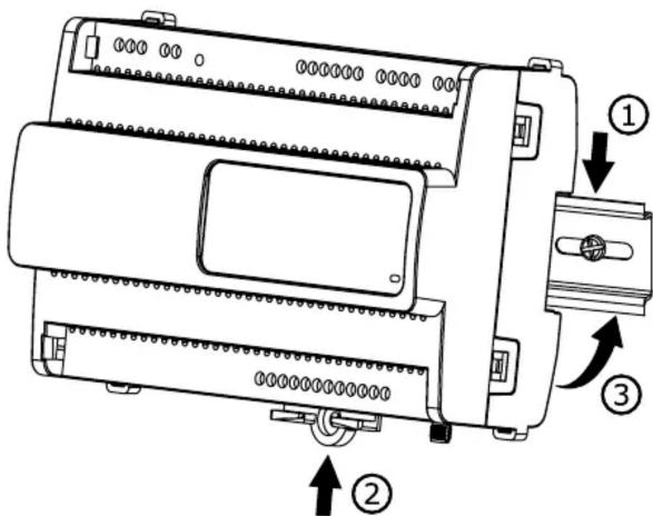 Technical diagram of an electronic device with labeled components and directional arrows indicating assembly or movement.